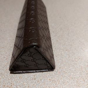 Gucci eyeglasses(readers)case brown w design, triagular, fun